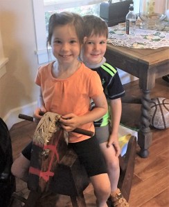 Elsa and Liam take Nelson for a rde.